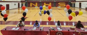 Austin Koep, Emerson Garlie, Grace McCoshen, and Ayla Puppe sign their national letters of intent