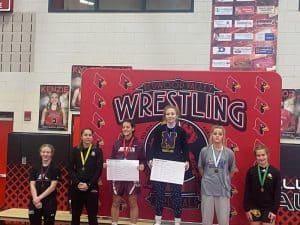Lainey Houts advanced to the girls state wrestling tournament after her first place finish.